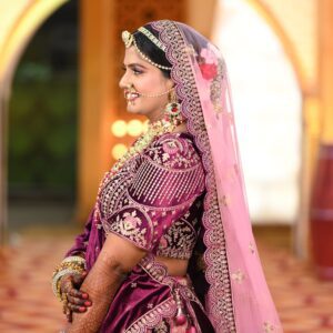 A North Indian bride with a traditional makeup look for dusky skin on her wedding day.